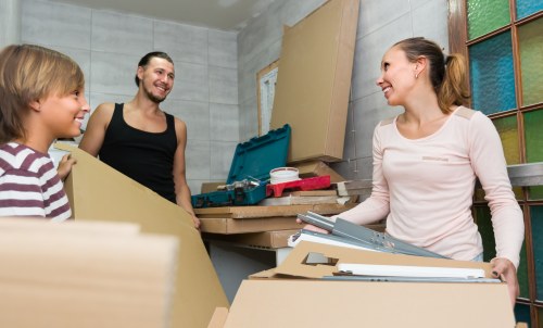 Removal van team preparing equipment safely before a move