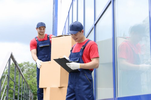 House removal team preparing a move in Earls Court near a residential building