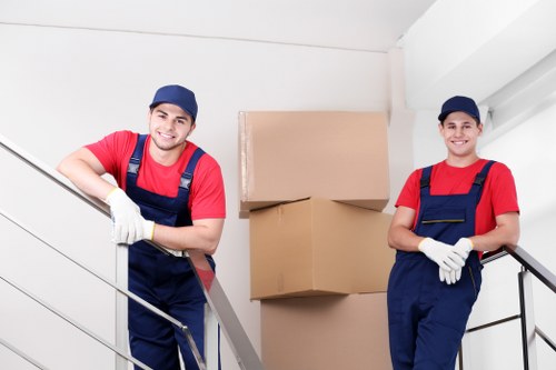 Packed boxes and furniture prepared for a local flat move in Earls Court