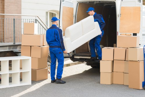 Moving team handling a home relocation in Earls Court street surroundings