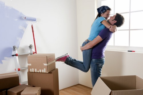 Boxes and furniture being loaded into a removals van for a local Earls Court job