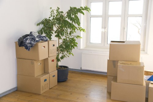 Business equipment and boxes being loaded for a local Earls Court move