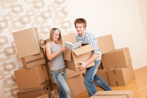 Movers loading belongings carefully for a local Earls Court move