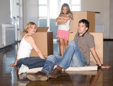 Loading furniture and boxes into a removal van in Earls Court